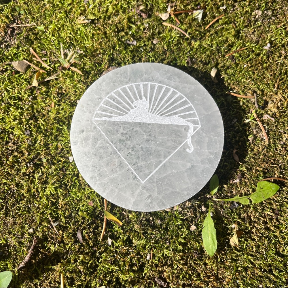 One (1) small gemstone Grateful Dead etched puck